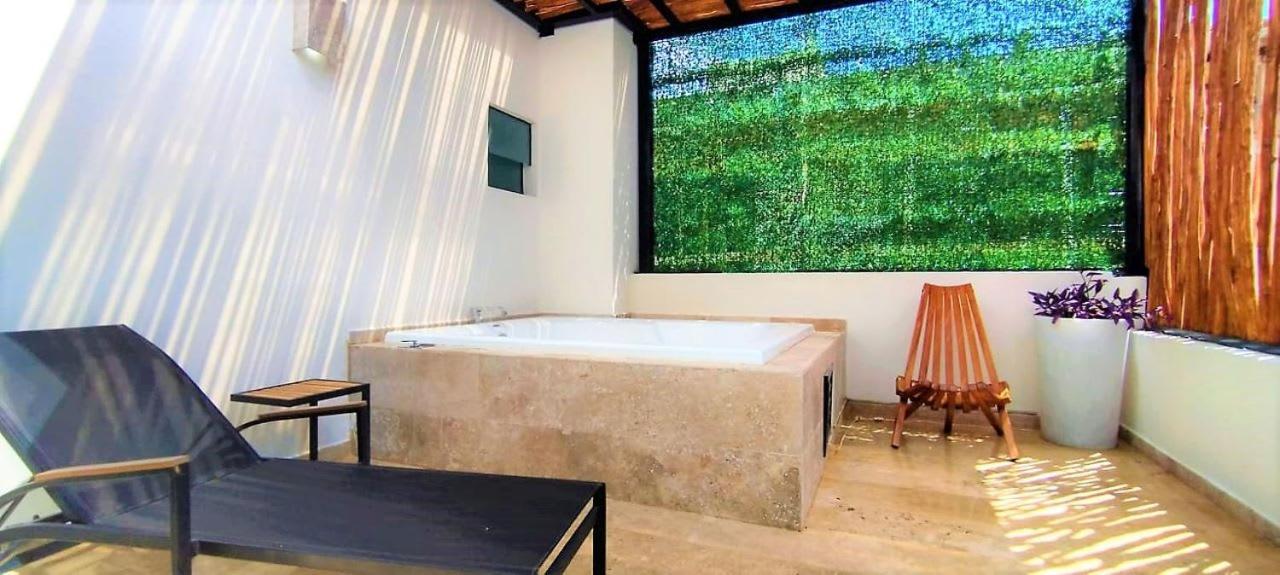 Сasa de vacaciones 2 Story With Spatub, Oceanview Roof Pool & Gym Onsite Playa del Carmen